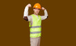 © Arsentyev Vladimir - the man in a construction helmet, a vest shows force of a biceps of the hands bent in an elbow