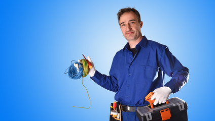 Uniformed electrician with tools and electrical equipment blue background