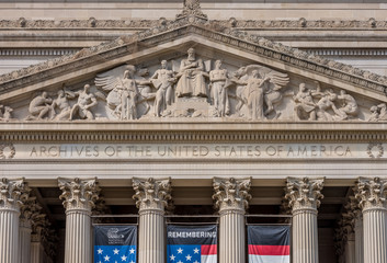 Wall Mural - United States National Archive Building in Washington DC with USA flag