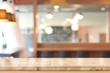 Empty table top in blurred bokeh office interior space background