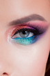 © Ulia Koltyrina - Bright eye makeup. Pink and blue color, colored eyeshadow.