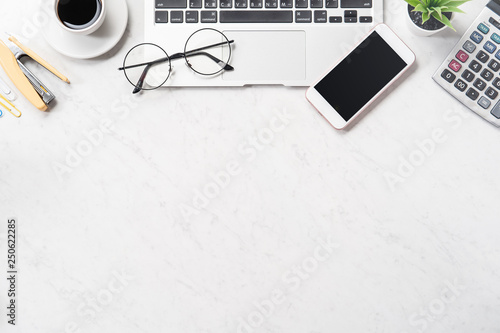 Stylized Clean Marble Office Working Desk With Smartphone Laptop
