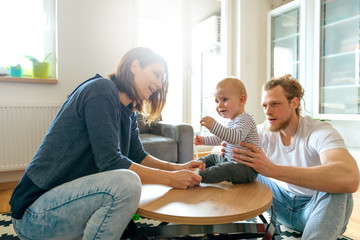 Wall Mural - Parents with baby boy