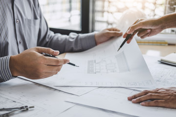 Wall Mural - construction and structure concept of engineer or architect meeting for project working with partner