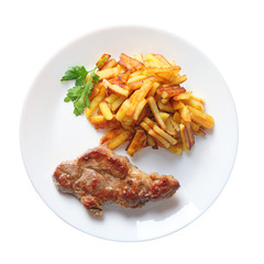 Wall Mural - steak with fried potatoes isolated top view