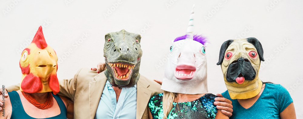 Happy family wearing different carnival masks - Crazy people having fun wearing on chicken, carlino, t-rex and unicorn mask - Concept of bizarre, humor and masquerade holidays lifestyle party - obrazy, fototapety, plakaty 