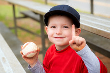 Cute Boy Playing Tee Ball Or Baseball