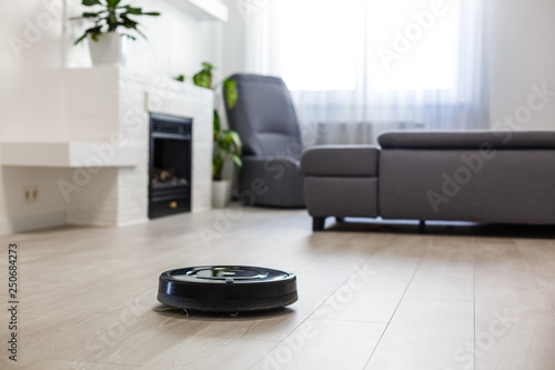 Robotic Vacuum Cleaner On Laminate Wood Floor In Living Room Buy