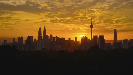 Wall Mural - 4k Timelapse of Kuala Lumpur city during sunrise.