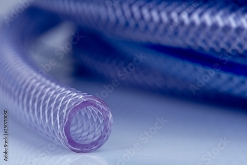 Macro of soft PVC braided transparent compressor hose Tableau sur Toile