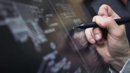 Wall Mural - architect using creative pen display tablet working with drawings in office