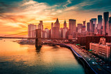 Fototapeta  - Must see when visiting New York City. View of Lower Manhattan and  Brooklyn at sunset. Night scene. Light trails. City lights. Urban living, travel, real estate  and transportation concept
