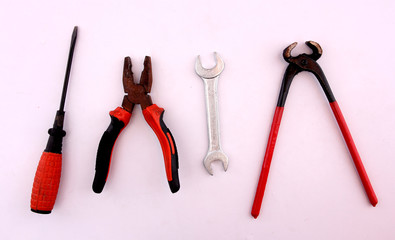 Construction tools with a white backdrop.