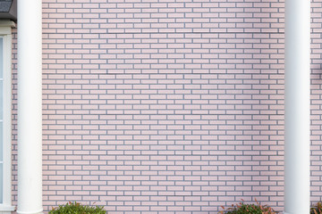 Wall Mural - empty soft pink brick wall and white pole.