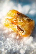 Unusual Yellow Handmade Soap, Macro Photo In Winter On The Snow, Amber Stone