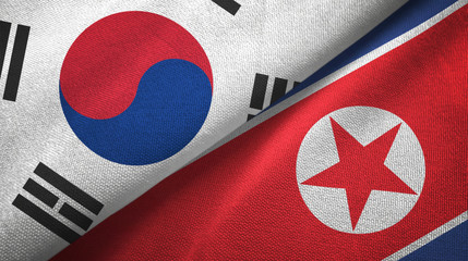 Wall Mural - South Korea and North Korea two flags textile cloth, fabric texture