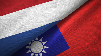 Netherlands and Taiwan two flags textile cloth, fabric texture