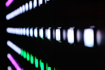 Wall Mural - colorful light buttons in a grid