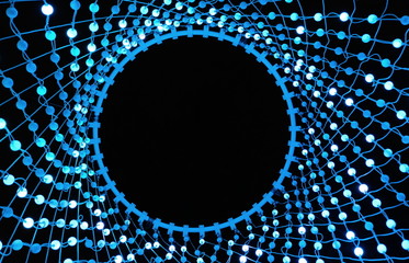 Wall Mural - Colorful lights in a circle shaped net