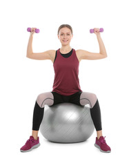 Poster - Young woman doing sports exercises isolated on white. Home fitness