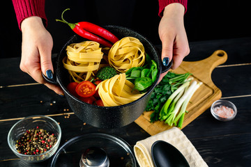 Poster - original Italian style pasta dinner on dark background. Italian cuisine