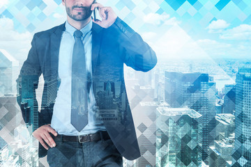 Canvas Print - Friendly businessman on phone in blue city