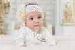 © aletia2011 - Portrait of cute adorable baby girl with flower on head