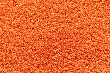 Texture Of A Orange Carpet With A Large Naps.