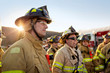 © Cavan Images - Group of firefighters standing outdoors