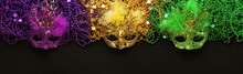 Purple, Gold, And Green Mardi Gras Beads And Masks Background