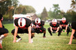 © Cavan Images - Teenage football players exercising