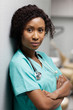 © Cavan Images - Portrait of young female doctor