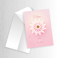 Poster - Top view of Mother's Day greeting card design with envelope on white wooden texture background.