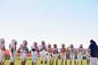 © Cavan Images - Coach speaking to teenage football team (14-15, 16-17)