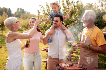 Canvas Print - Family having a barbecue party