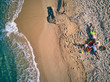 © haveseen - Beautiful beach with family top view shot