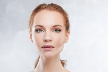 Redhead girl beauty portrait, skin care concept.