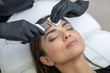 © forma82 - Beautiful woman is having a facial treatment in spa. Cavitation peeling.