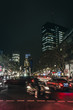Busy street in downtowm of Berlin at night. Night urban cityscape in Berlin. Berlin night life concept.