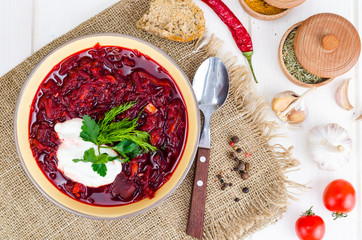 Wall Mural - Delicious hot vegetable soup with beetroot, Russian borscht
