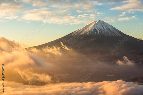 Fuji mountain and the mist over Lake Kawaguchiko at beautiful sunrise , Yamanashi, Japan, Mount Fuji or Fujisan located on Honshu Island, is the highest mountain in Japan Poster Mural XXL