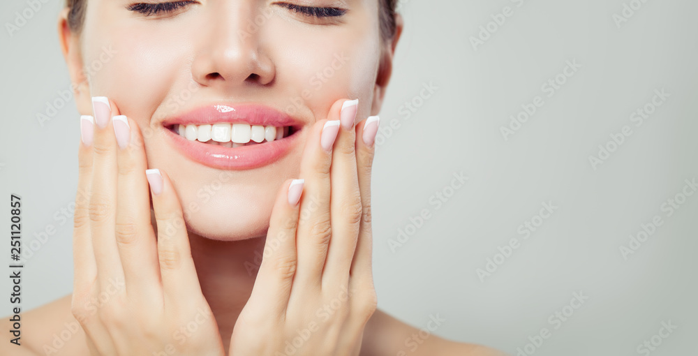 Perfect woman smile and manicured hand. French manicure and pink lipgloss makeup - obrazy, fototapety, plakaty 