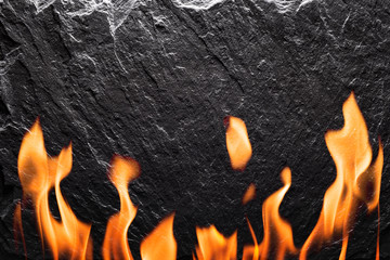 Wall Mural - Black slate with fire closeup. Can be used like food background