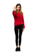 © luismolinero - A full-length shot of a Young woman with red sweater making stop gesture denying a situation that thinks wrong over isolated white background