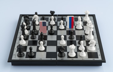 Symbols flag of Russia and the United States on the chessboard. The concept of political game.