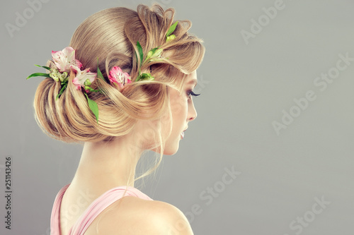 Beautiful Model Girl With Elegant Hairstyle And Rose Flowers In A