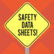 © Zofia - Handwriting text writing Safety Data Sheets. Concept meaning document lists information relating occupational safety Blank Diamond Shape Color Road Warning Signage with One Leg Stand photo