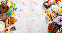 Selection Of Colorful Sweets - Chocolate, Donuts, Cookies, Lollipops, Ice Cream Top View