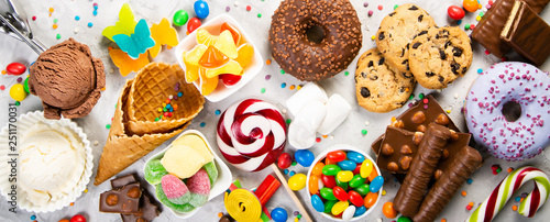 Cuadros en Lienzo Selection of colorful sweets - chocolate, donuts, cookies, lollipops, ice cream