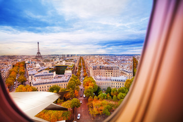 Paris France and Eiffel tower from plane window